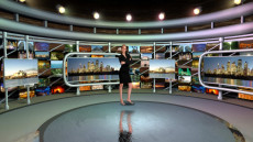 Virtual Set Studio 113 for 4K is a circular room with presentation monitors all around it.